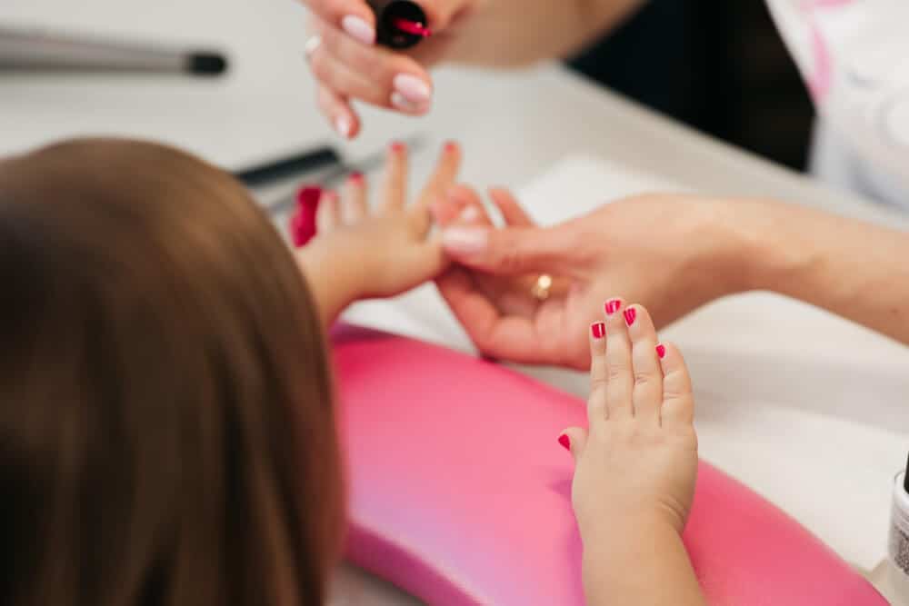 Woman getting nail treament